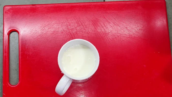 Prepare the custard: Mix vanilla custard powder with the reserved cup of milk, ensuring no lumps form.
