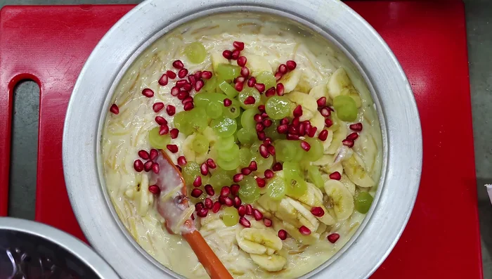 Chop your desired fruits (banana, grapes, pomegranate etc.).