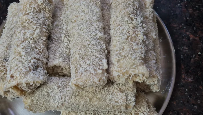 Fry the rolls in hot oil over medium heat until golden brown and crispy.