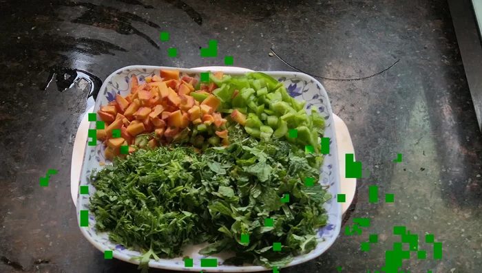 Add finely chopped carrot, capsicum, mint, and coriander leaves.