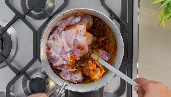 Add clean, washed chicken (vinegar wash optional) and fry for 2 minutes. Do not overcook (327.12).