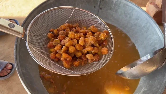 Remove the soaked plums from the water. Save the leftover water to make sherbet later.