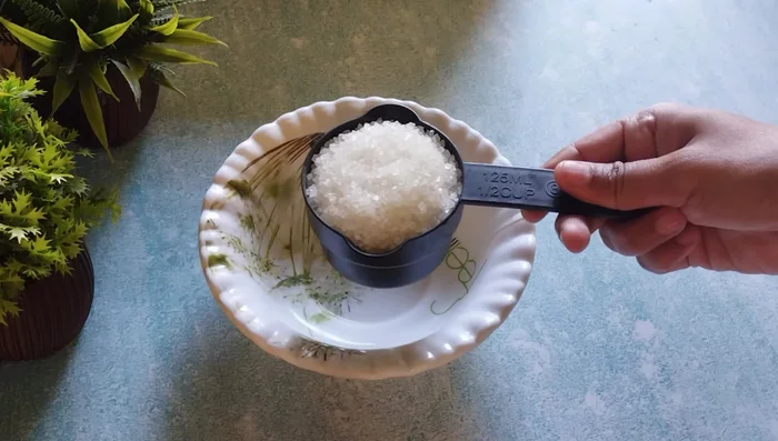 Take ½ cup sugar in a bowl. Adjust sweetness to your taste.