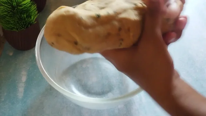 Knead the dough again until smooth. Divide it into small balls.