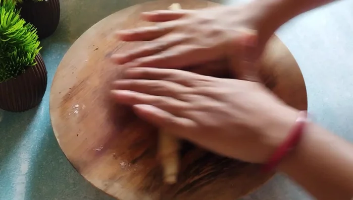 Roll the spiced discs tightly, making them slightly larger. Cut into smaller pieces.