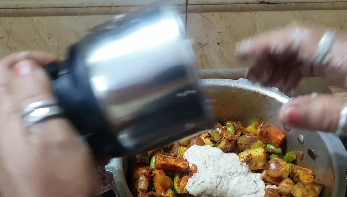 Add grated coconut (optional) and mix.