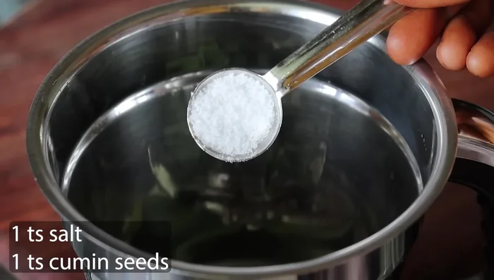 Mix ingredients according to recipe instructions. This could include combining jaggery, water, spices, and potentially yogurt for the Neer More.