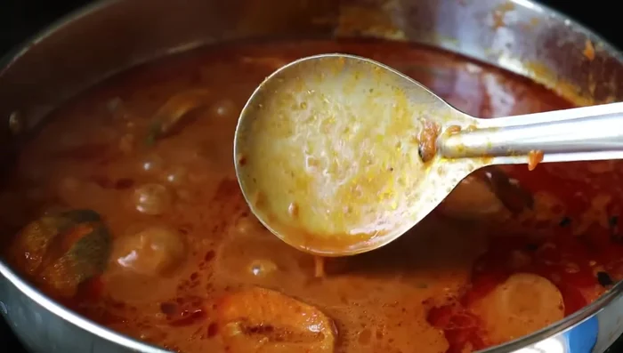 Garnish and serve hot with rice.