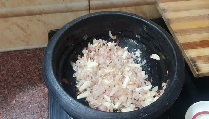 Add the spice mixture and water. Mix well and check the salt.