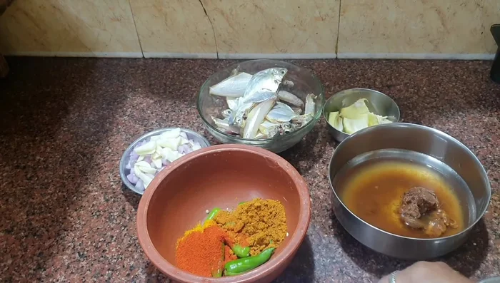 Add coriander leaves, chili powder, turmeric powder, and cumin powder.
