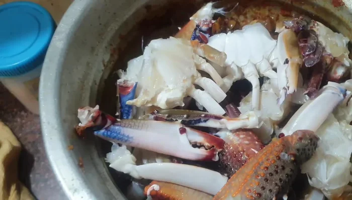 Add the crab and mix well with the spices. Cook for a minute.