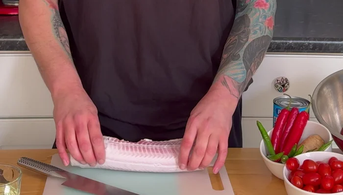 Cut the shark into steaks.