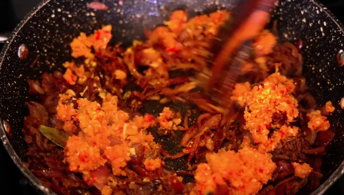 Add the chili-ginger-garlic paste and cook for 3-5 minutes.