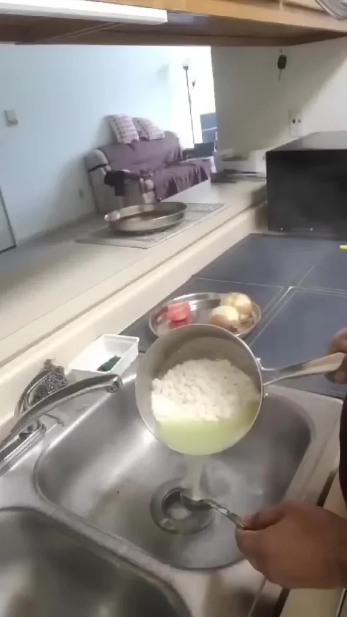 Strain the paneer through a cloth to remove excess water.