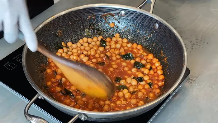Add 1/2 cup of water to loosen the mixture. Bring to a gentle boil, cover, and cook for 5 minutes on medium heat. (120.52)