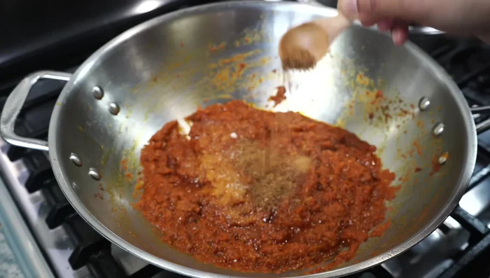 Add salt, sugar, garam masala powder, and dried fenugreek leaves. Stir well.