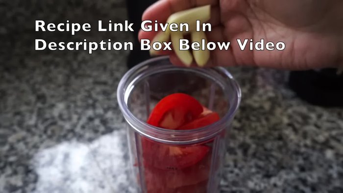 In a blender jar, blend tomatoes, garlic, and ginger into a smooth puree.