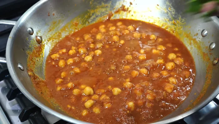 Taste and adjust seasonings. Add chopped coriander leaves and heavy cream (or coconut cream/milk). Simmer for 5 more minutes.