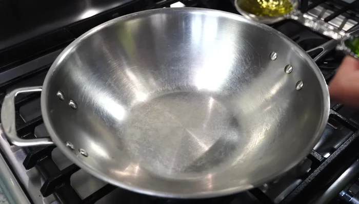 In a pot, heat oil and butter. Add cumin seeds once butter melts.