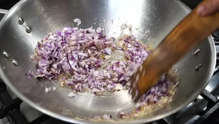 Add finely chopped onions and 1/4 tsp salt. Cook until lightly browned.