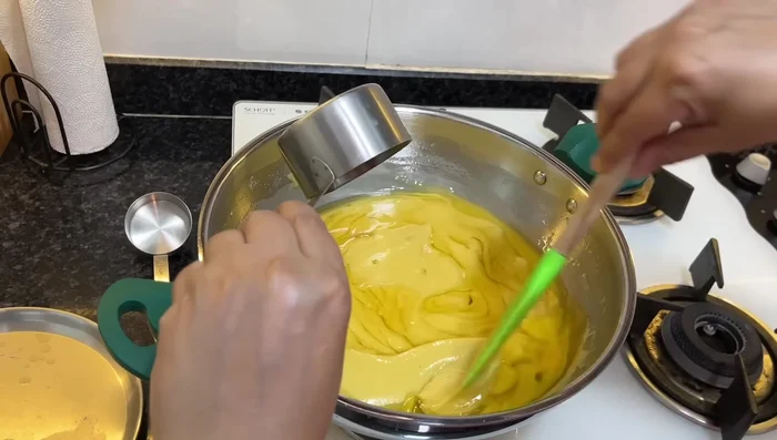 Add another half cup of ghee, continue stirring until the mixture pulls away from the sides of the pan and forms a thick, smooth consistency. Turn off the heat immediately.