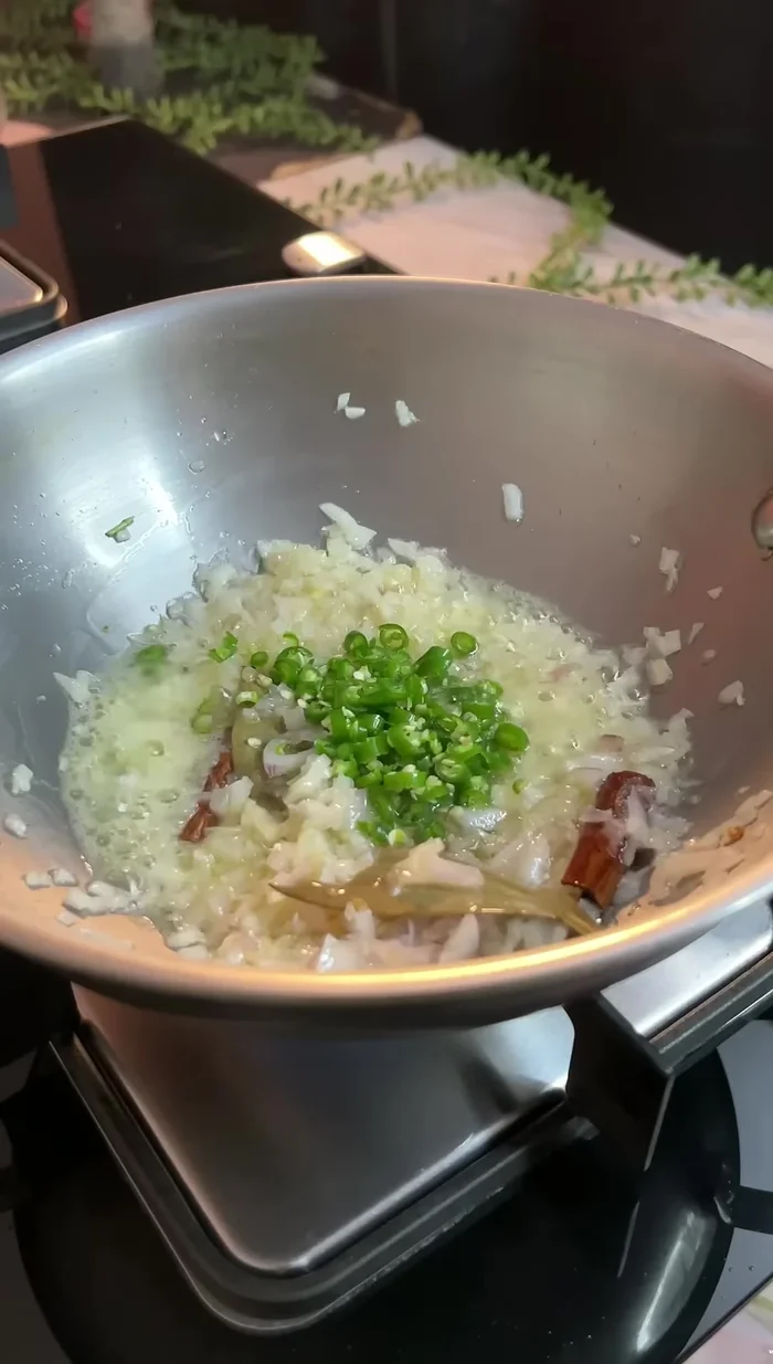 Add green chilies and cook.