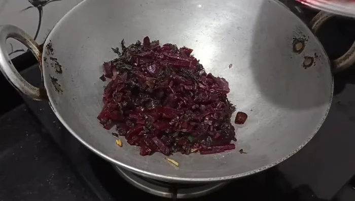 Add the beetroot mixture from step 4. Stir and press gently to soften the vegetables while frying.
