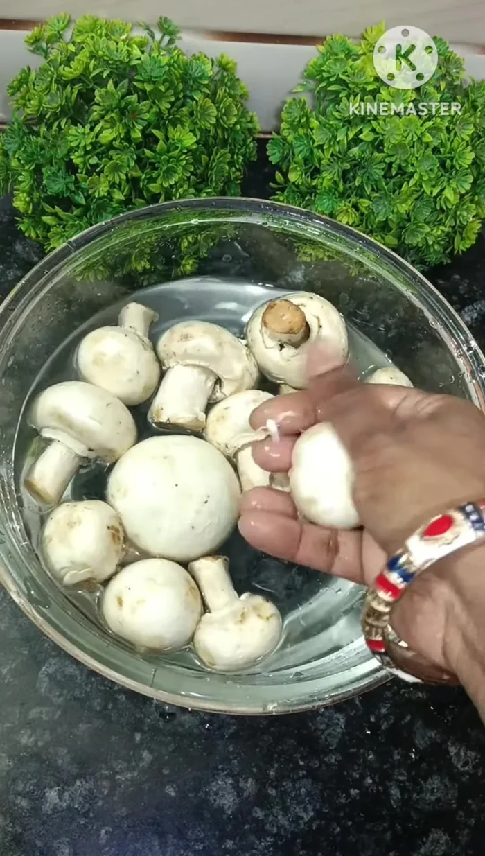 Crispy Mushroom Pakora: In a bowl, mix water, all-purpose flour, rice flour, Kashmiri chili powder, cumin powder, black pepper powder, chili powder, garam masala, ginger-garlic paste, salt, and lemon juice. Make a thick batter.