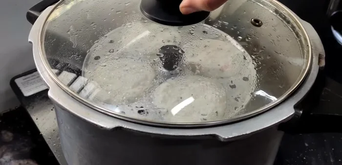 Carefully remove the idlis from the steamer and let them cool slightly before demolding.