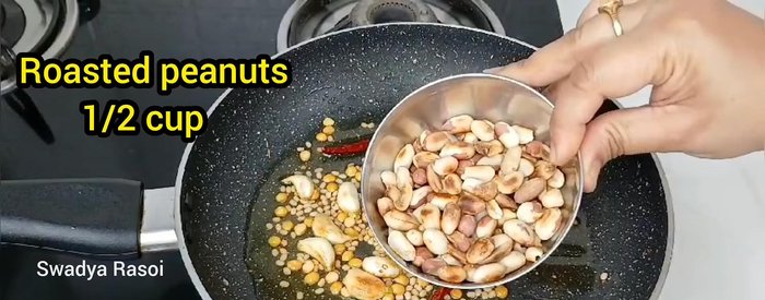Add peanuts and fry for 1 minute.