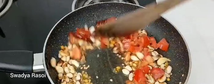 Add tomatoes and salt, cook until tomatoes soften slightly. Let cool.