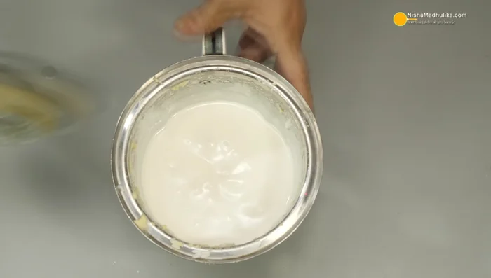Grind the soaked rice separately until fine.