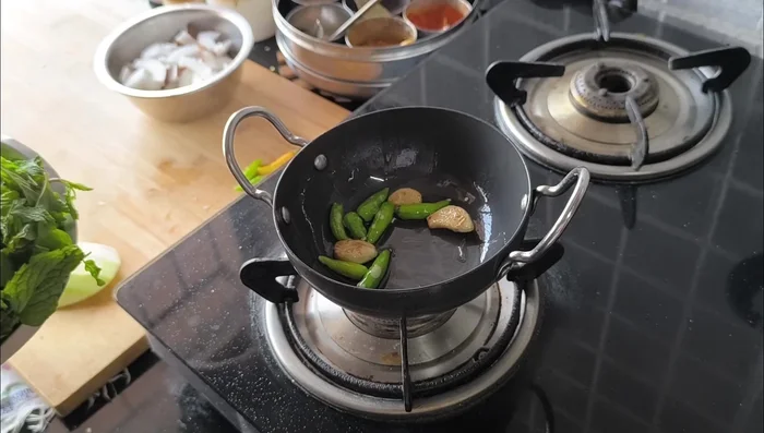 Add a few curry leaves.