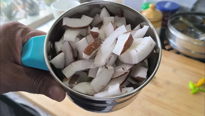 Add salt to taste and grind to a fine paste, adding water gradually to achieve desired consistency.