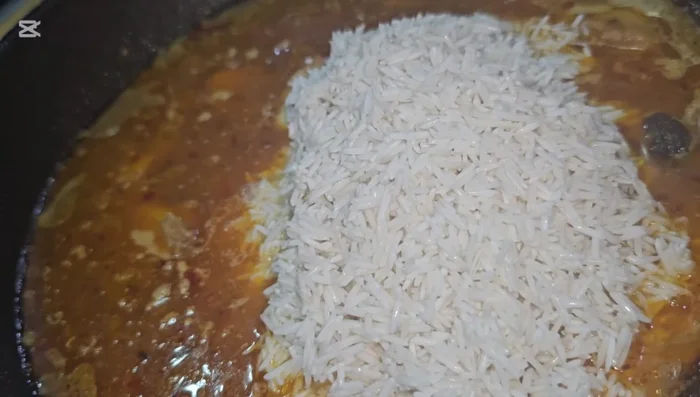Add rice and mix gently (257.44).