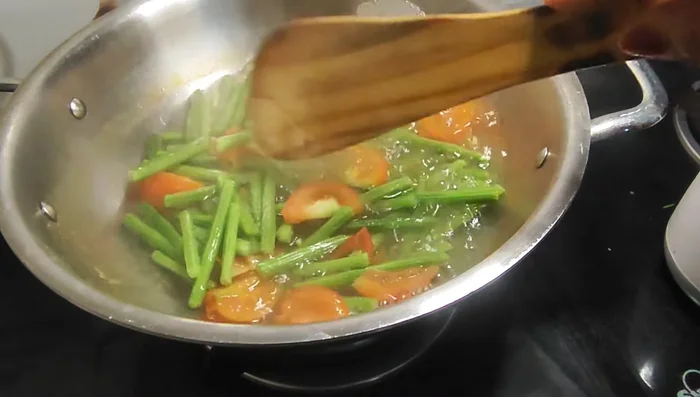 Continue cooking until the horse gram softens (about another 5 minutes). Do not add salt yet.