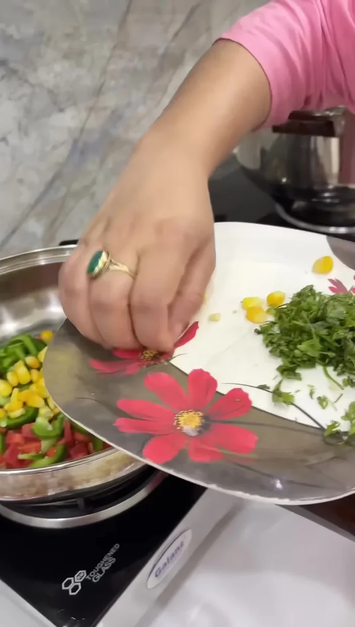 In a separate pan, sauté garlic and other vegetables for the soup.