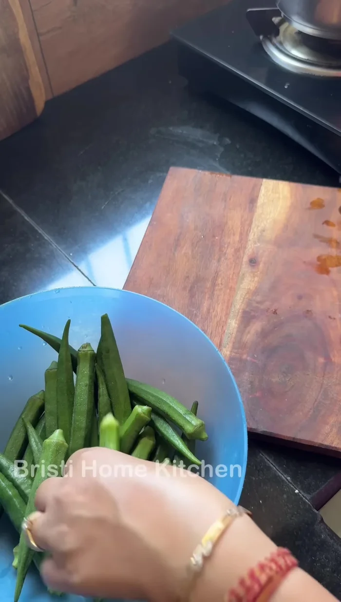 Cook on medium flame till 3-4 whistles (122.56). If soaked and not coarsely ground, cook till 5-6 whistles (127.88).