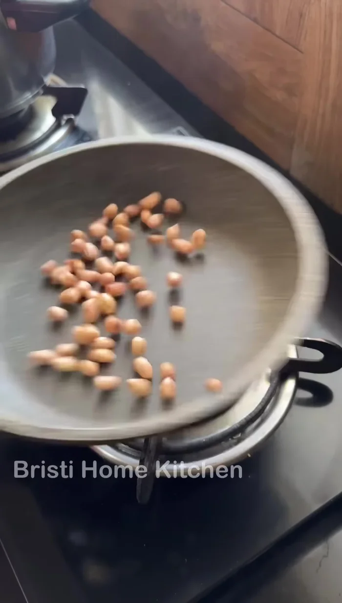 For the stuffing: Fry peanuts, sesame seeds, and desiccated coconut until light golden (155.04).