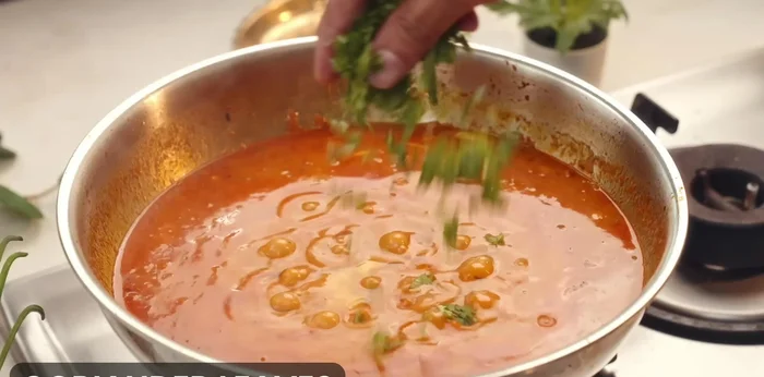 Before turning off the gas, stir in 1 tablespoon of ghee and chopped coriander leaves. Cover and cook for 1 minute.