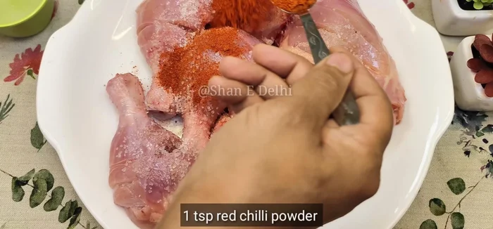 Marinate chicken with the listed spices and yogurt. Mix well and let it sit for at least an hour (or overnight for better flavor).