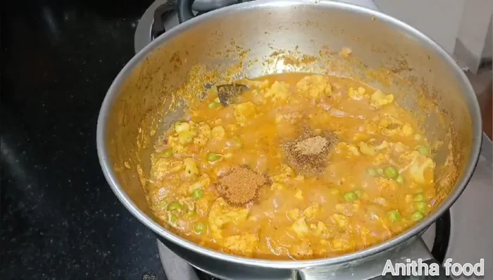 Add coriander leaves, garam masala powder, and fried chopped onions for crunch.