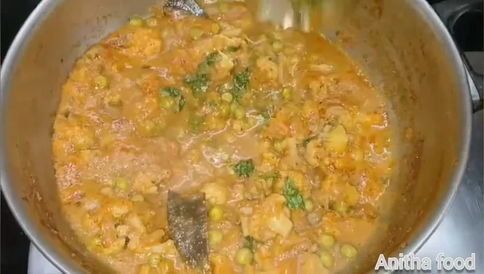 Garnish with coriander leaves and serve with puri.