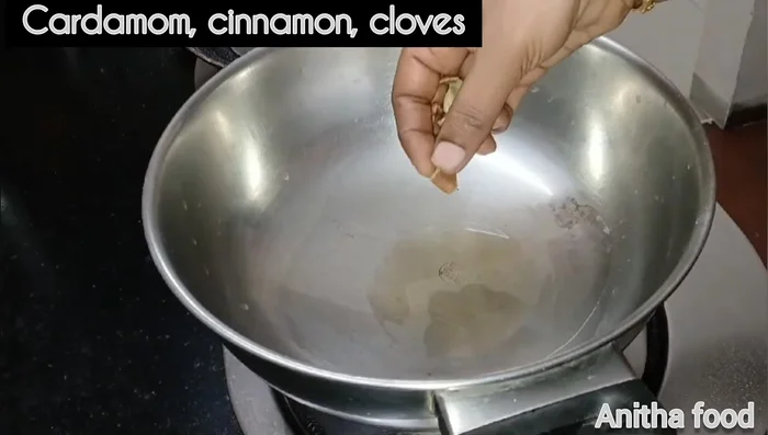 Heat oil in a pan, add cloves, cardamom, coriander seeds, anise, and cumin seeds.