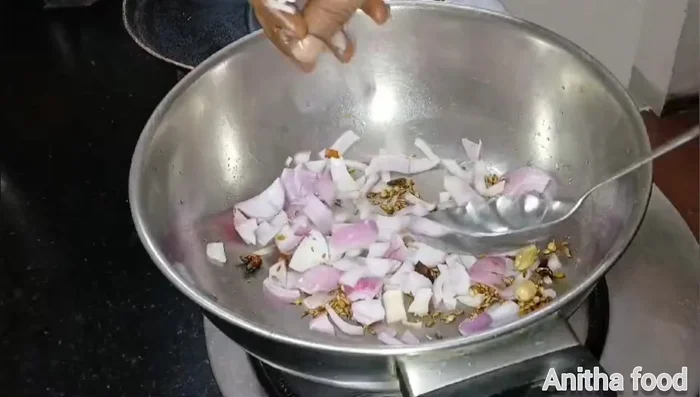 Add chopped onions, ginger-garlic paste, and chopped tomatoes. Fry until softened.