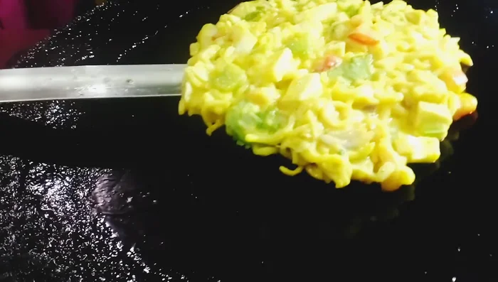 Shallow fry the pancakes on both sides until golden brown and crispy.