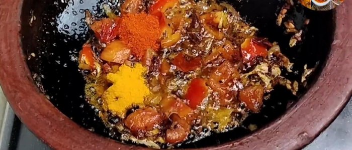 Add 1 teaspoon each of turmeric powder, red chili powder, coriander powder, cumin powder, and salt. Fry the spices until fragrant and the oil separates.