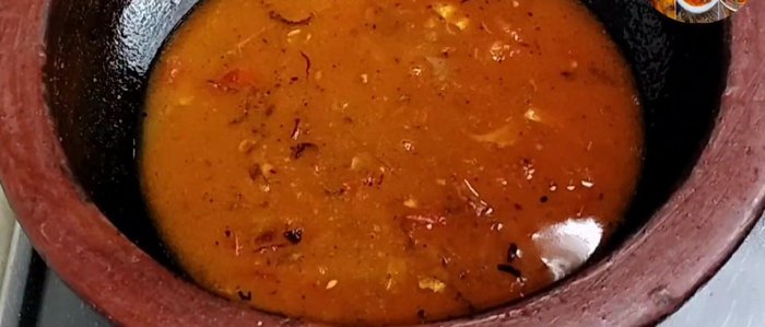 Add 1 glass of water, mix well, and bring to a boil. Then, add the fried fish.