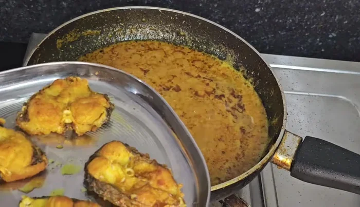 Bring to a boil, then gently add the fried fish.
