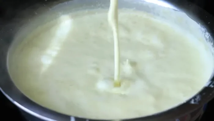 Freeze the kulfi mixture until solid.